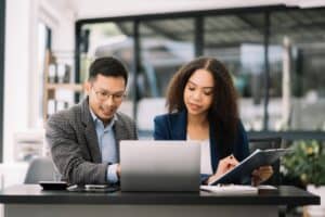 Business owners looking over SBA loans